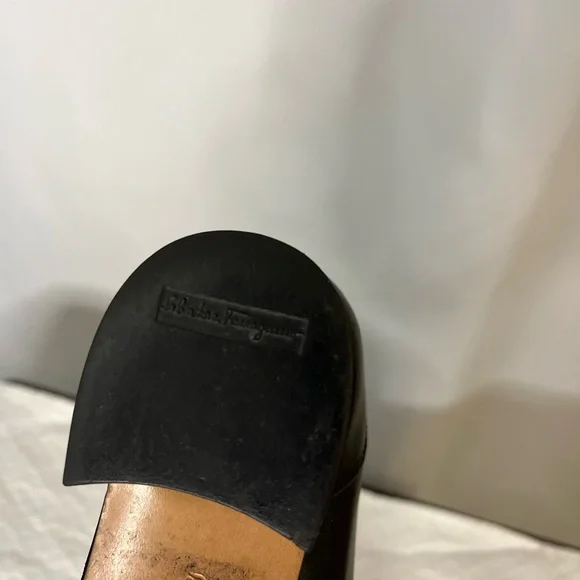 Salvatore Ferragamo Black Loafer Flats with silver logo hardware. Corpcore